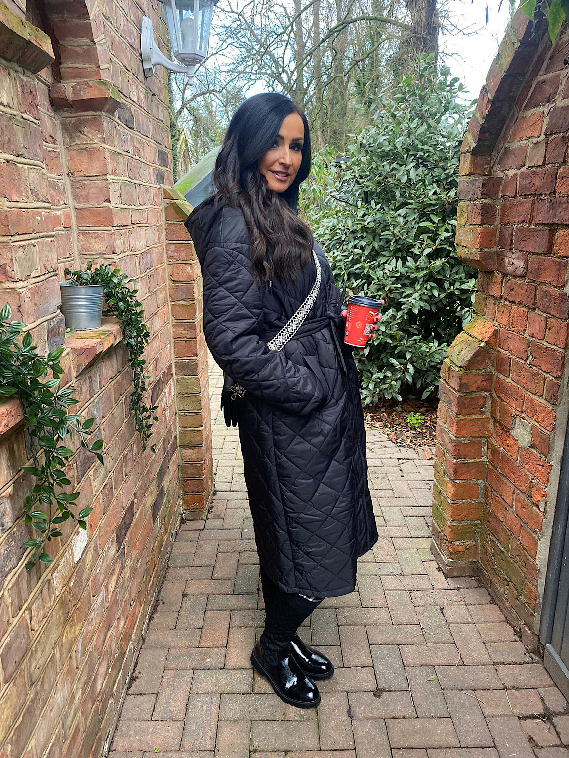 Black Quilted Long Line Coat Maria